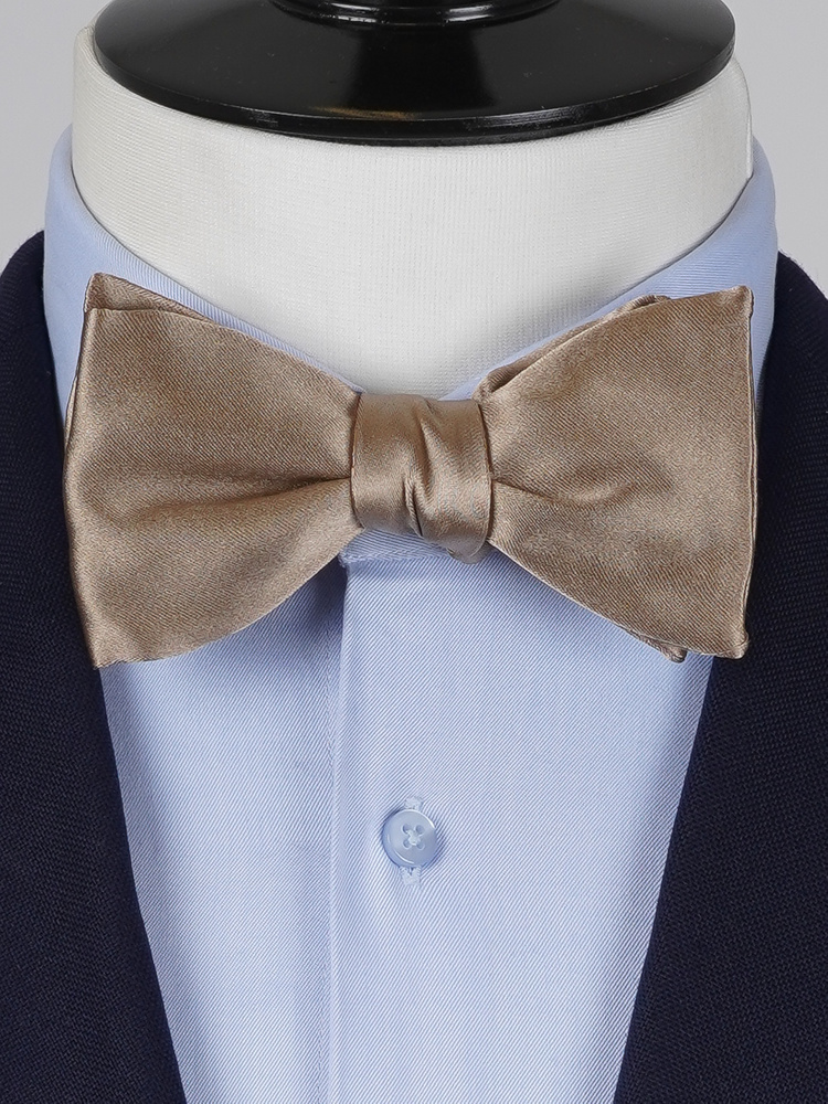 Varm beige selvbinder butterfly
