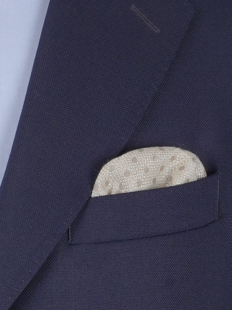Beige pilkullinen taskuliina Porto